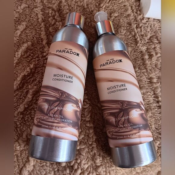 WE ARE PARADOXX 8.45-fl oz Moisture Conditioner set of 2 (one w/ a broken pump)